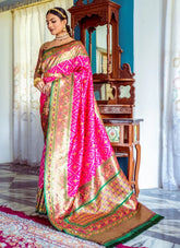 Wedding Wear Patola Woven Art Silk Saree in Magenta